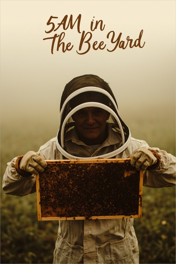 A beekeeper in a veil holding up a honeycomb frame in morning fog, headline 5AM in the Bee Yard